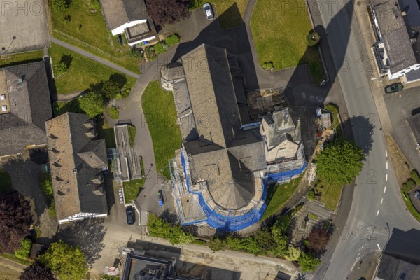 Aerial view, cat. Church of St. Anna, partial covering and scaffolding due to renovation work, Nuttlar, Bestwig, Sauerland, North Rhine-Westphalia, Germany, catholic church, St. Anna, partial covering, scaffolding, renovation work, church, renovation, architecture, religious, building, village, landscape, scaffolding, construction, reparation, aerial view, sky, exterior view, community, heritage-protected, historic, restoration, tower, steeple, roof, dome, summer, day