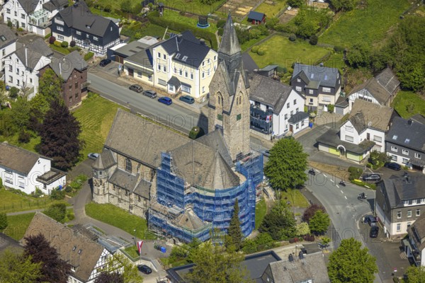 Aerial view, cat. Church of St. Anna, partial covering and scaffolding due to renovation work, Nuttlar, Bestwig, Sauerland, North Rhine-Westphalia, Germany, church, St. Anna, partial covering, scaffolding, renovation work, architecture, renovation, religious building, building, town, aerial view, exterior view, religion, construction site, repair, village, infrastructure, historical, tower, roof, landscape, structure, scaffolding, construction, preservation, maintenance, overview
