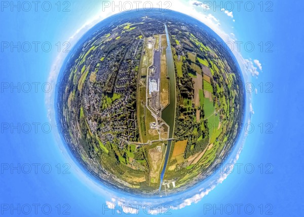 Aerial view, Wasserstadt Aden on the Datteln-Hamm Canal, construction area for planned urban quarter on the site of the former Haus Aden colliery, globe, fisheye image, fisheye image, 360 degree image, tiny world, little planet, fisheye image, Oberaden, Bergkamen, Ruhr area, North Rhine-Westphalia, Germany, architecture, construction area, Datteln-Hamm canal, terrain, industrial area, infrastructure, circle effect, landscape, little planet, panorama, perspective, planning, settlement, urban development, urban neighbourhood, tiny world, urban, bird's eye view, water town Aden, Haus Aden colliery, fisheye