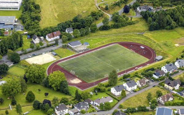 Aerial view, Wabachstadion, football stadium and athletics stadium, Bad Laasphe, Wittgensteiner Land, North Rhine-Westphalia, Germany, architecture, outdoor area, leisure, football pitch, football stadium, building, site view, green area, infrastructure, landscape, athletics track, athletics stadium, aerial view, sport, sports facility, sports event, stadium, town, structure, urban development, stands, German place, overview