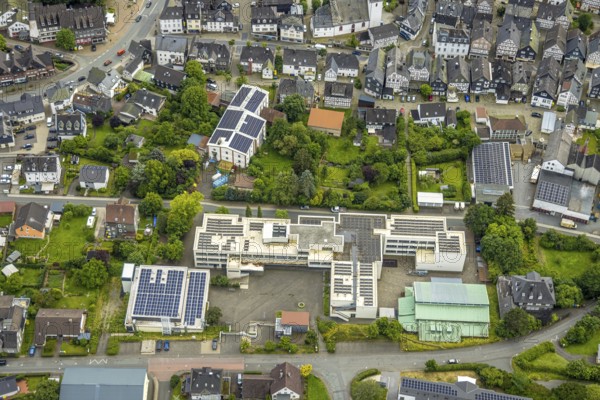 Aerial view, Städt. Gymnasium with solar roof, Bad Laasphe, sports hall TV Laasphe 1863 e.V., Wittgensteiner Land, North Rhine-Westphalia, Germany, architecture, educational institution, village, education, building, infrastructure, youth, educational institution, aerial view, school, solar systems, solar roof, solar energy, sport, sports hall, urban landscape, structure, Städt. Gymnasium, TV Laasphe 1863 e.V., gymnasium, environment, club building, renewable energy, renewable energies, rural, sustainable energy