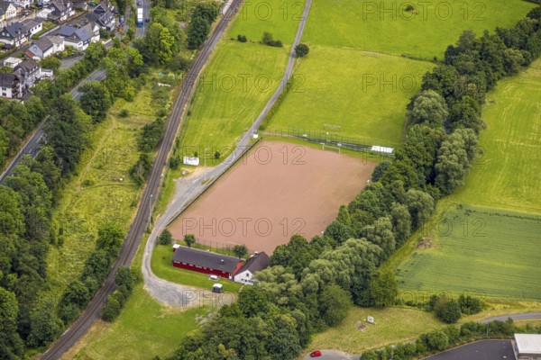 Aerial view, Niederlaasphe sports field, Niederlaasphe SG, Niederlaasphe, Bad Laasphe, Wittgensteiner Land, North Rhine-Westphalia, Germany, trees, village, drone shot, recreation, outdoor sports, leisure, spring, football pitch, building, municipality, green, green area, hill, infrastructure, landscape, nature, region, summer, playing field, sports facilities, sports facilities, sports field, sports event, town, daylight, stands, surroundings