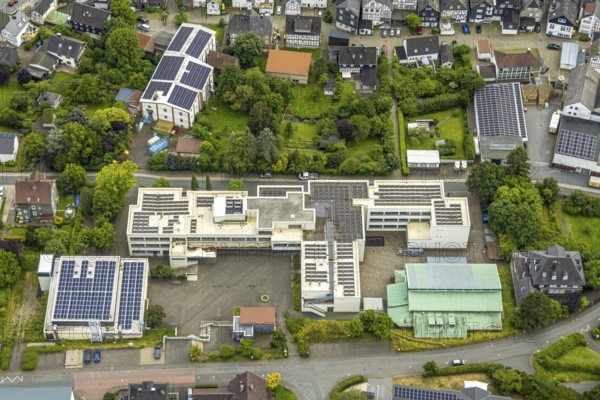 Aerial view, Städt. Gymnasium with solar roof, Bad Laasphe, sports hall TV Laasphe 1863 e.V., Wittgensteiner Land, North Rhine-Westphalia, Germany, architecture, exterior, education, educational centre, roof, village, facilities, building, community, infrastructure, landscape, sustainability, photovoltaic, school, solar roof, solar panels, sports, sports facility, sports hall, city view, TV Laasphe 1863 e.V., tag, technology, german architecture, renewable energy, european, modern, urban high school, environmentally friendly, ecology