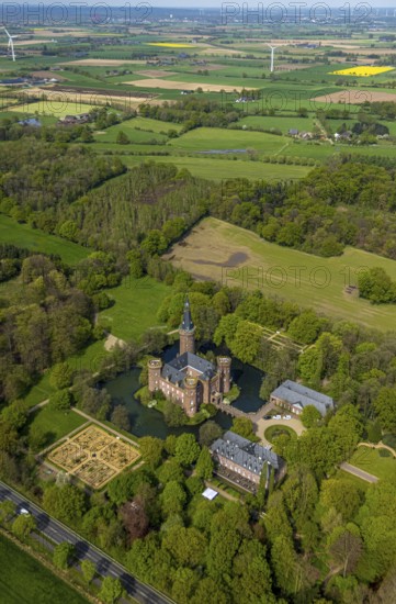 Aerial view, Museum Schloss Moyland, neo-Gothic moated castle and castle park surrounded by meadows and fields and forest, excursion destination on the Lower Rhine, Moyland, Bedburg-Hau, Lower Rhine, North Rhine-Westphalia, Germany, architecture, excursion destination, visitor, recreation, fields, leisure, geography, history, green spaces, sky, culture, landscape, museum, nature, outdoor, panorama, perspective, tranquillity, Moyland Castle, castle park, beauty, sight, daylight, tourism, forest, meadows, rural, neo-Gothic moated castle