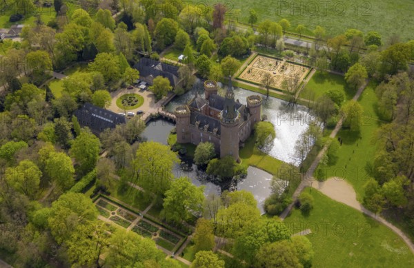 Aerial view, Museum Schloss Moyland, neo-Gothic moated castle and castle park surrounded by meadows and fields and forest, excursion destination on the Lower Rhine, Moyland, Bedburg-Hau, Lower Rhine, North Rhine-Westphalia, Germany, architecture, excursion destination, building, visitor destination, trees, heritage, recreation, fields, leisure, history, green space, idyllic, culture, cultural heritage, landscape, nature, park, tranquillity, castle park, beauty, sight, tourism, forest, water, meadows, outdoors, historic, neo-Gothic moated castle