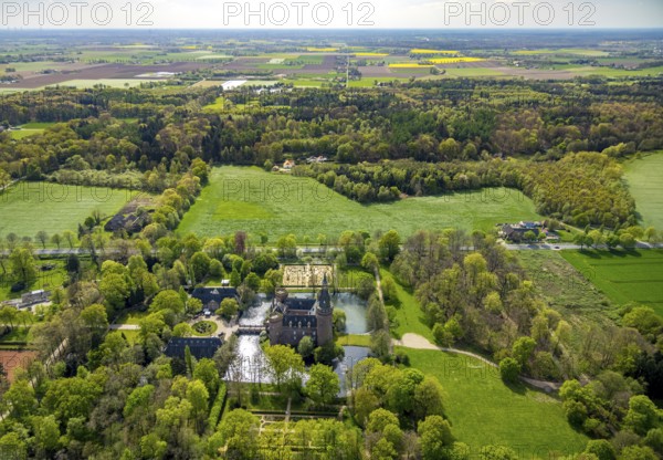 Aerial view, Museum Schloss Moyland, neo-Gothic moated castle and castle park surrounded by meadows and fields and forest, excursion destination on the Lower Rhine, Moyland, Bedburg-Hau, Lower Rhine, North Rhine-Westphalia, Germany, architecture, excursion destination, exterior view, visitor destination, trees, recreation, fields, leisure, peace, history, green spaces, idyll, culture, cultural heritage, landscape, aerial view, nature, perspective, castle park, beauty, sight, daylight, tourism, forest, meadows, historic building, neo-gothic moated castle