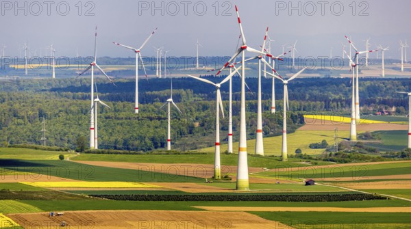 Aerial view, wind park and wind farm wind energy plant, wind turbines and rape fields near Radlinghausen, Messinghausen, Brilon, East Westphalia, Sauerland, North Rhine-Westphalia, Germany, wind park, wind farm, wind energy plant, wind turbines, rape fields, Radlinghausen, renewable energy, landscape, agriculture, nature, fields, environment, sustainable energy, technology, energy production, yellow, green, sky, rural, bird's eye view, power generation, modern technology, sustainable development, electricity, energy production, clean energy, environmental sustainability