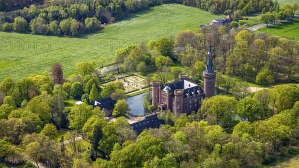Aerial view, Museum Schloss Moyland, neo-Gothic moated castle and castle park surrounded by meadows and fields and forest, excursion destination on the Lower Rhine, Moyland, Bedburg-Hau, Lower Rhine, North Rhine-Westphalia, Germany, architecture, excursion destination, exterior view, education, educational centre, recreation, fields, leisure, history, green, sky, culture, art, landscape, museum, nature, perspective, tranquillity, Moyland Castle, castle park, beauty, sight, day, tourism, forest, moated castle, meadows, historic, neo-Gothic