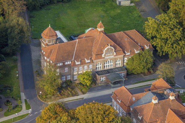 Aerial view, LVR Clinic, House Business Administration and Kitchen on Buchenweg, autumnal forest, Hau, Bedburg-Hau, Lower Rhine, North Rhine-Westphalia, Germany, architecture, exterior, treetops, Buchenweg, facility, Europe, colours, building, health care, health care system, house, autumn, infrastructure, institution, season, clinic grounds, kitchen, landscape, perspective, region, structure, forest, business administration, well-kept, autumnal, natural environment, vegetation, overhead view