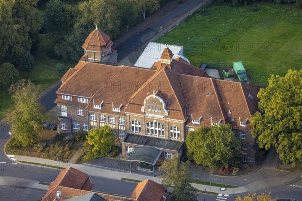 Aerial view, LVR Clinic, House Business Administration and Kitchen on Buchenweg, autumnal forest, Hau, Bedburg-Hau, Lower Rhine, North Rhine-Westphalia, Germany, business administration, kitchen, building, Buchenweg, architecture, autumnal, forest, trees, nature, medical, facility, health care, plant, environment, region, Europe, infrastructure, hospital, terrain, terrain overview, autumn, leaves, colours, landscape, sky, daylight, outdoor shot, city, institution, care, aerial view, perspective