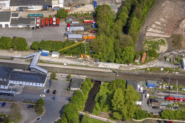 Aerial view, Bestwig railway station, Deutsche Bahn AG, construction site with construction crane, covered pedestrian crossing, Bestwig, Sauerland, North Rhine-Westphalia, Germany, construction site, construction crane, pedestrian crossing, covered, railway, train, rails, traffic, infrastructure, construction, construction work, transport, building, aerial view, city, urban, development, modernisation, architecture, bridge, commuter, civil engineering, public transport, landscape, region