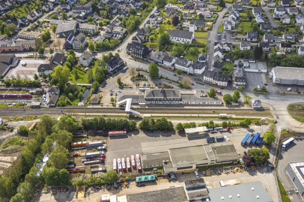 Aerial view, Bestwig railway station, Deutsche Bahn AG, construction site with construction crane, covered pedestrian crossing, Bestwig, Sauerland, North Rhine-Westphalia, Germany, construction site, construction crane, pedestrian crossing, covered, railway, infrastructure, railway, construction, work, building, transport, traffic, city, architecture, technology, local transport, construction work, rails, station area, modern, urban, construction, bridge, public transport, above, industry