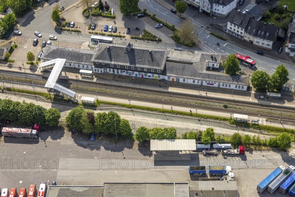 Aerial view, Bestwig railway station, Deutsche Bahn AG, construction site with construction crane, pedestrian crossing covered, Bestwig, Sauerland, North Rhine-Westphalia, Germany, construction site, construction crane, pedestrian crossing, covered, infrastructure, railway, rails, new construction, bridge, construction, architecture, traffic, commuter, urban, urban, transport, travel, German, technology, scaffolding, station, renovation, top view, structure, building, works, construction works, engineering, landscape, infrastructure projects