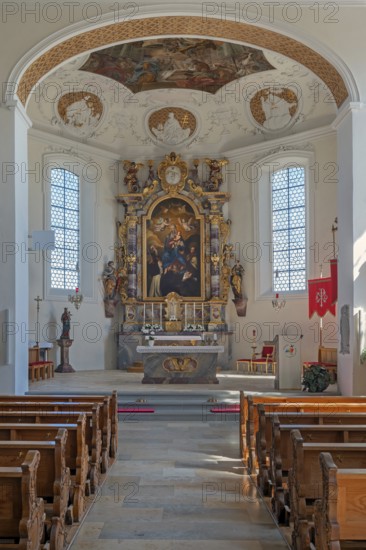 Interior of the Roman Catholic parish church of the Assumption of the Virgin Mary, main altar with image of the Virgin Mary in Gebrazhofen, district of the large district town of Leutkirch im Allgäu, district of Ravensburg, Baden-Württemberg, Germany
