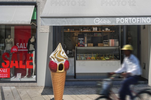 Shop window with swimwear 70% SALE, and gelateria, Dornbirn, Vorarlberg, Austria