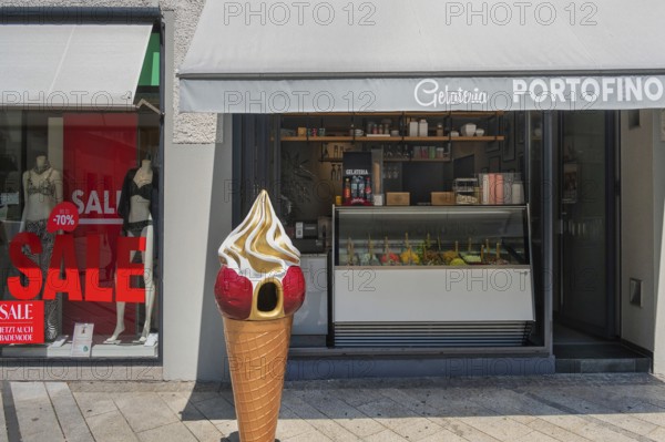 Shop window with swimwear 70% SALE, and gelateria, Dornbirn, Vorarlberg, Austria