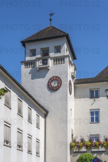Light grey façade with tower, clock and floral decorations, Dornbirn, Vorarlberg, Austria