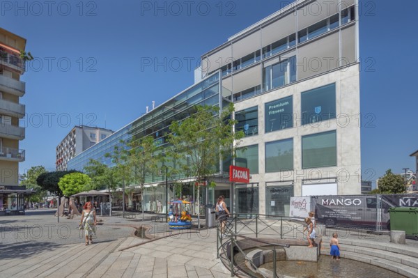 Concrete buildings with large glass façade and fountain, Dornbirn, Vorarlberg, Austria
