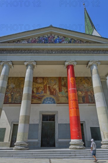 The Roman Catholic parish church of St Martin, entrance with a monumental Ionic temple façade, with six free columns and classical gable triangle and large fresco, Dornbirn, Vorarlberg, Austria