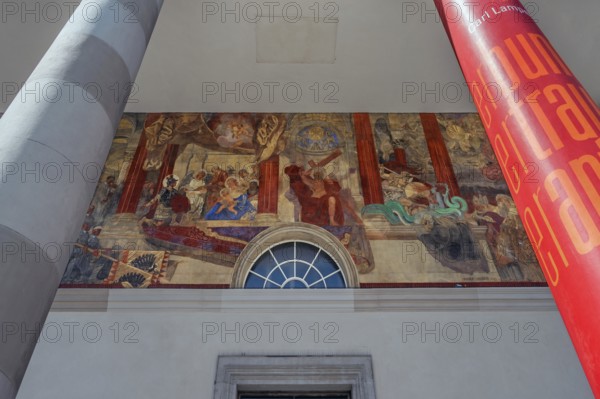 The Roman Catholic parish church of St Martin, entrance with a monumental Ionic temple façade, with six free columns and classical gable triangle and large fresco by Josef Huber 1923, Dornbirn, Vorarlberg, Austria