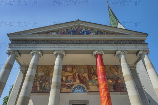 The Roman Catholic parish church of St Martin, entrance with a monumental Ionic temple façade, with six free columns and classical gable triangle and large fresco, Dornbirn, Vorarlberg, Austria