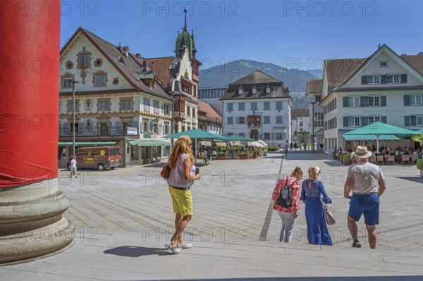 The Steinhauser or Johann Luger House and the town museum with tourists on the market square, Dornbirn, Vorarlberg, Austria