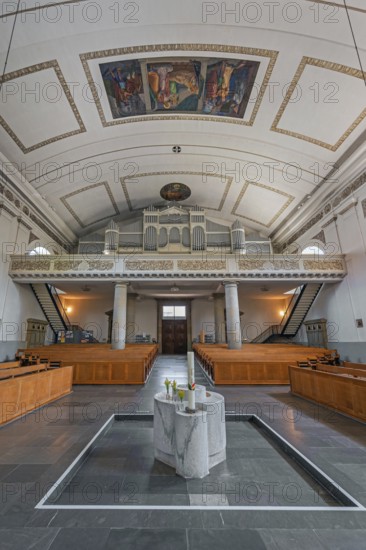 The Roman Catholic parish church of St Martin, interior with organ loft, Behmann organ, ceiling frescoes and baptismal font, Dornbirn, Vorarlberg