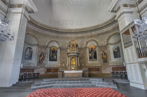 The Roman Catholic parish church of St Martin, interior with altar and wall frescoes, Dornbirn, Vorarlberg, Austria