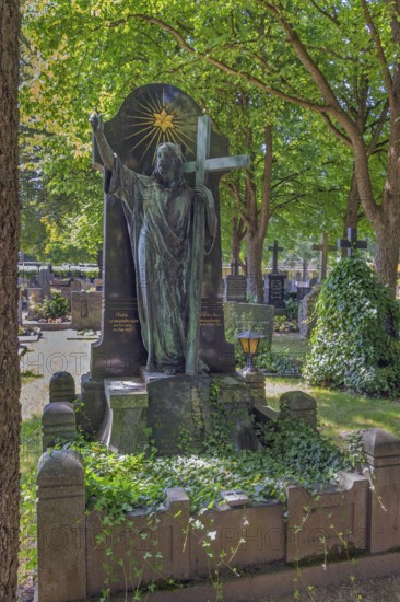 Gravesite with Christ figure, catholic cemetery, Kempten, Allgäu, Bavaria, Germany