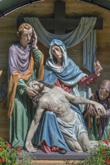 Gravesite with depiction of the Descent from the Cross, Catholic cemetery, Kempten, Allgäu, Bavaria, Germany