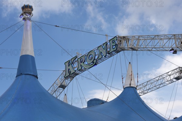 Circus tent, circus tent with large luminous lettering in front of a blue sky, Circus-Krone, Kempten, Allgäu, Bavaria, Germany