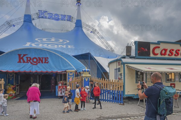 Children being photographed in front of circus tent, Circus tent, Circus-Krone, Kempten, Allgäu, Bavaria, Germany