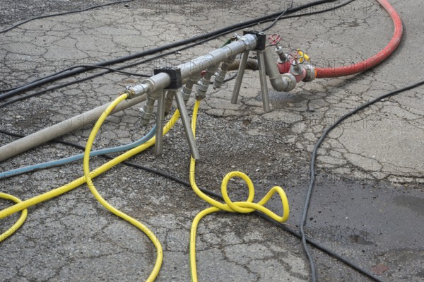 Distribution pipe with tangle of water hoses, Circus-Krone, Kempten, Allgäu, Bavaria, Germany