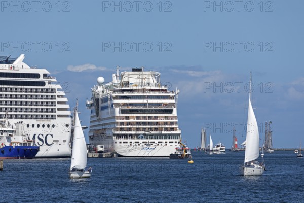 Cruise ships MSC Poesia and Aida mar in the harbour, sailing boats, Hanse-Sail, Unterwarnow, Warnemünde, Rostock, Mecklenburg-Western Pomerania, Germany