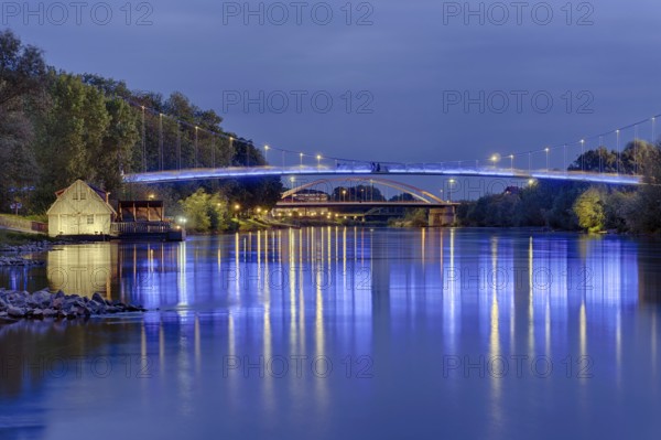 Ship mill and Weser bridges illuminated Rinteln Germany