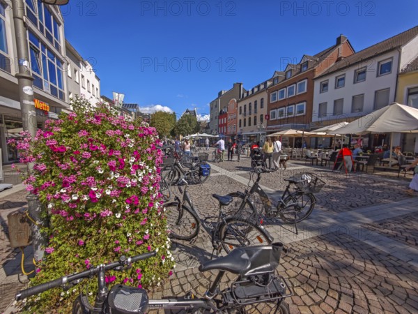 Pedestrian zone, traffic-calmed, old town, architecture, bicycles, café, parasol, flowers, shops, blue sky, sunshine, Brühl, North Rhine-Westphalia, Germany