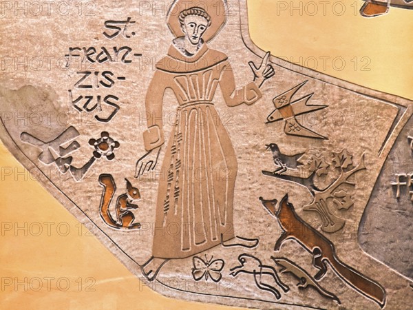 St Francis, Francis of Assisi, patron saint of animals, Middle Ages, birds, fox, squirrel, butterfly, frog, depiction on house wall, Brühl, North Rhine-Westphalia, Germany