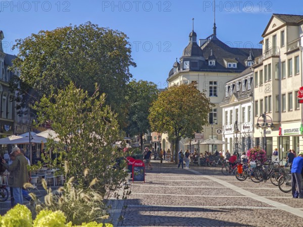 Pedestrian zone, traffic-calmed, old town, architecture, shops, trees, plants, bicycles, cobblestones, people, blue sky, sunshine, Brühl, North Rhine-Westphalia, Germany