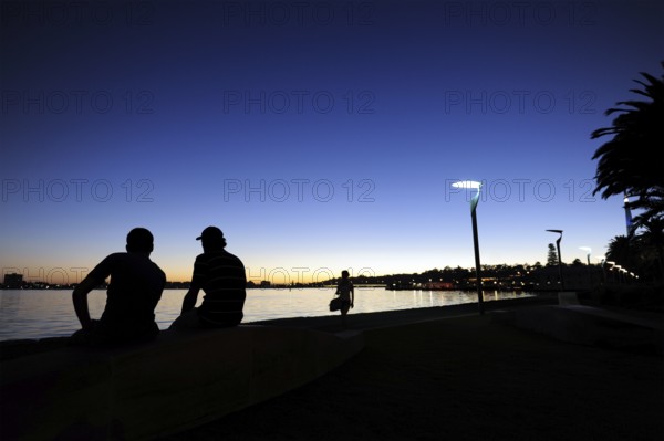 People at the riverside, evening mood at the Swan River, Central City Area, Perth, Western Australia, WA, Australia
