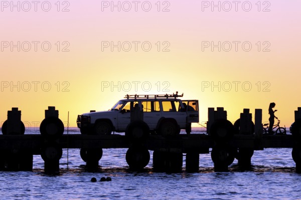 Sunset on the beach, car on a jetty near Lancelin, Perth, Western Australia, WA, Indian Ocean, Australia