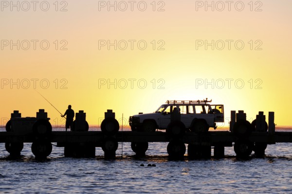 Sunset on the beach, car on a jetty near Lancelin, Perth, Western Australia, WA, Indian Ocean, Australia