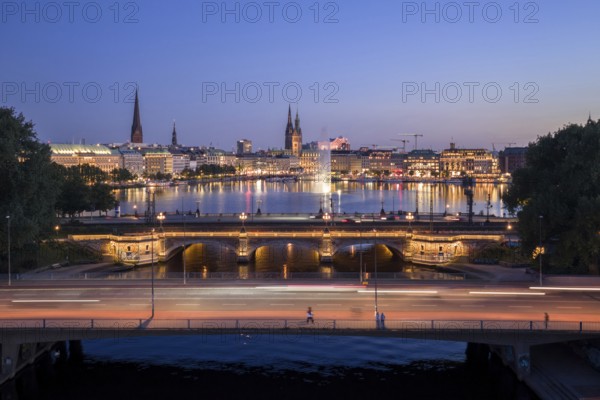 Aerial view of the Outer Alster and Inner Alster with Kennedy Bridge, Alster Fountain, Jungfernstieg, City Hall and Elbphilharmonie at blue hour, Hamburg, Germany