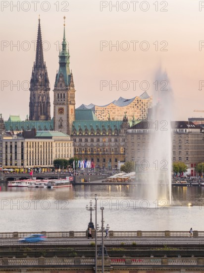 Aerial view of the Inner Alster with Kennedy Bridge, Alster Fountain, Jungfernstieg, City Hall and Elbphilharmonie at sunset, Hamburg, Germany