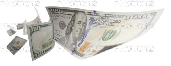 Randomly falling U.S. 100 dollar bills isolated on a white background