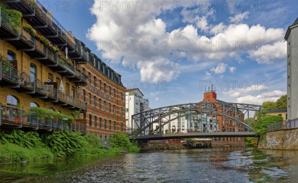 Könneritz Bridge, connection between the districts of Plagwitz and Schleußig and Mey and Edlich, industrial and residential building on the Weiße Elster river, factory building, Leipzig, Saxony, Germany