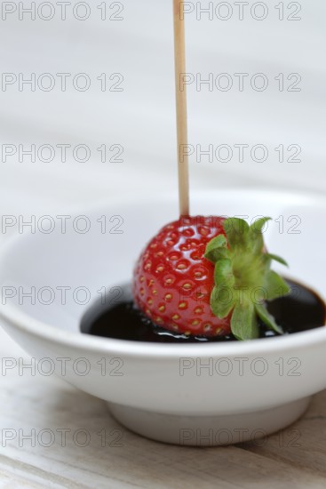 Strawberry and crema di balsamico in small bowls