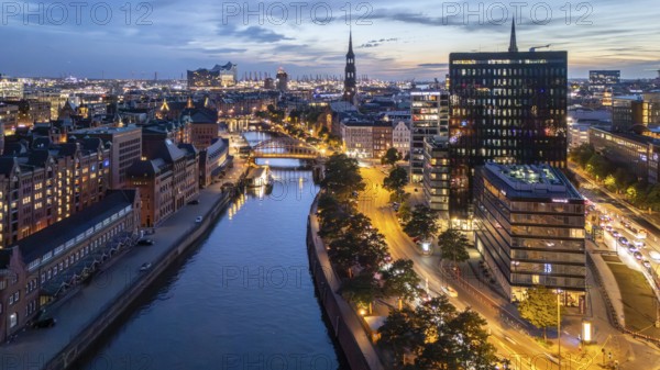 Aerial view of Hamburg's Speicherstadt warehouse district at blue hour with a view of the Zollkanal and Elbphilharmonie concert hall, Hamburg Germany