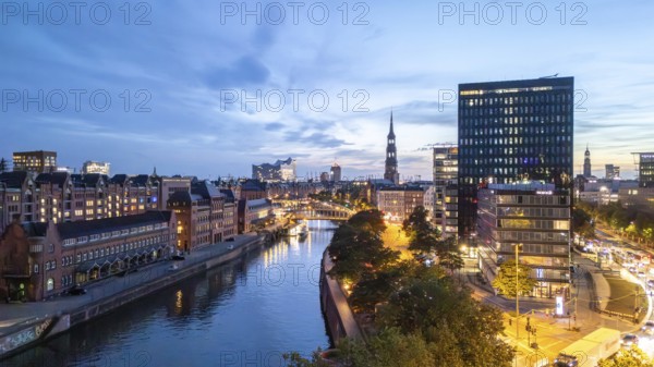 Aerial view of Hamburg's Speicherstadt warehouse district at blue hour with a view of the Zollkanal and Elbphilharmonie concert hall, Hamburg Germany