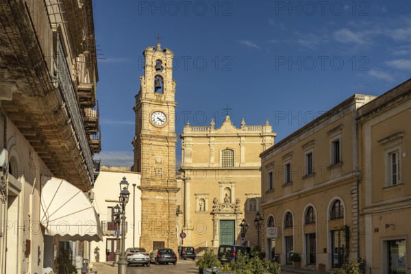 Clock tower and the church Chiesa di Maria Santissima Annunziata in Casarano, Apulia, Italy