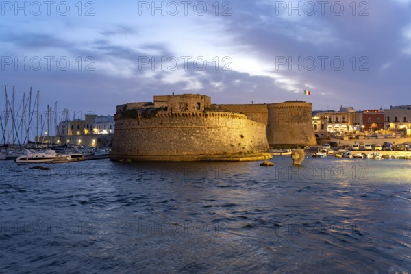 The Castello di Gallipoli fortress at dusk, Gallipoli, Apulia, Italy